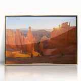 Large art print of Bryce Canyon with rich orange and red tones on a framed acrylic, in mid-century modernist style.
