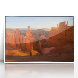 Framed acrylic print of Bryce Canyon with earthy red and orange tones, ideal for modern art wall decor.