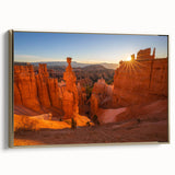 Framed canvas featuring a vintage-style landscape painting of Bryce Canyon in muted earth tones, ideal for bedroom wall art.