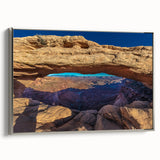 Framed canvas depicting a vintage-style landscape of Canyonlands, Utah, with a palette of earth tones.