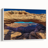 Vintage poster art of Canyonlands, featuring a colorful palette on framed canvas, ideal for living room decor.