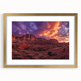 Extra large abstract art print of Utah's Capitol Reef in a gold frame, featuring textured red and earth tones.