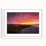 Abstract art print of Vermont scenery in muted green and blue tones on a framed white mat, ideal for dining room decor.