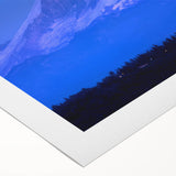 Art deco poster of Mount Rainier with muted green and blue tones on rolled canvas, suitable for dining room wall art.