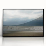 Large abstract wall art depicting the Olympic mountains in muted earth tones, framed in black acrylic.