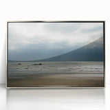 Mid-century modernist art depicting Olympic National Park in muted green and blue tones on a silver-framed acrylic print.