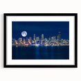 Extra large abstract art print of Seattle skyline in vibrant colors on textured canvas, framed in black.