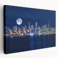 Side view of a large stretched canvas depicting the Seattle skyline in muted blue and gray tones.