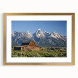 Extra large framed print of the Grand Tetons, featuring textured abstract art in muted earth tones.