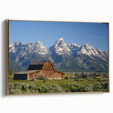 Framed canvas of the Grand Tetons landscape, featuring muted earth tones, ideal for bedroom wall art.