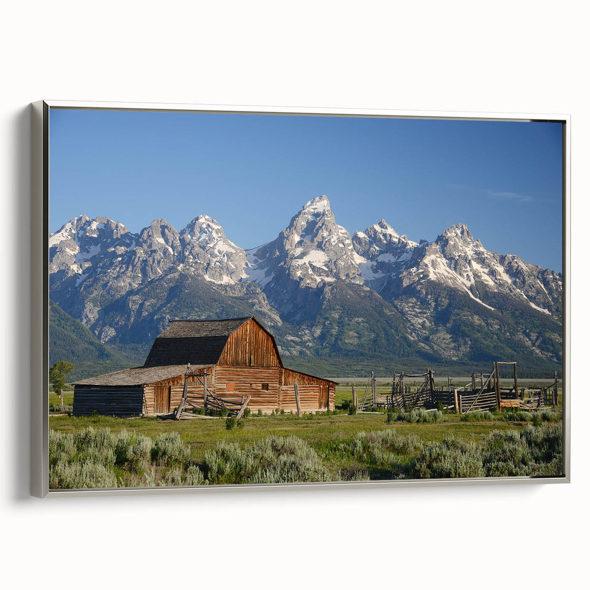 Framed canvas of Grand Tetons landscape in muted earth tones, ideal for a living room or office.