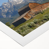 Art deco poster of Grand Tetons, featuring muted earth tones on rolled canvas, suitable for dining room decor.