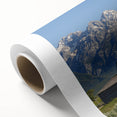 Art Deco style poster of the Grand Tetons, featuring muted earth tones on rolled canvas, suitable for nursery wall art.