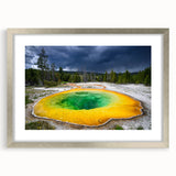 Textured art print depicting abstract Yellowstone scenery in earthy tones on a framed canvas, suitable for bedroom decor.