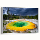 Vintage poster art of Yellowstone scenery on a framed canvas, featuring vibrant colors, ideal for living room decor.