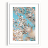 Abstract art print featuring spring-themed colors in pastel shades on a white framed canvas.