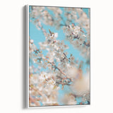 Vintage poster art of spring, featuring vibrant floral designs on a framed canvas, ideal for living room decor.