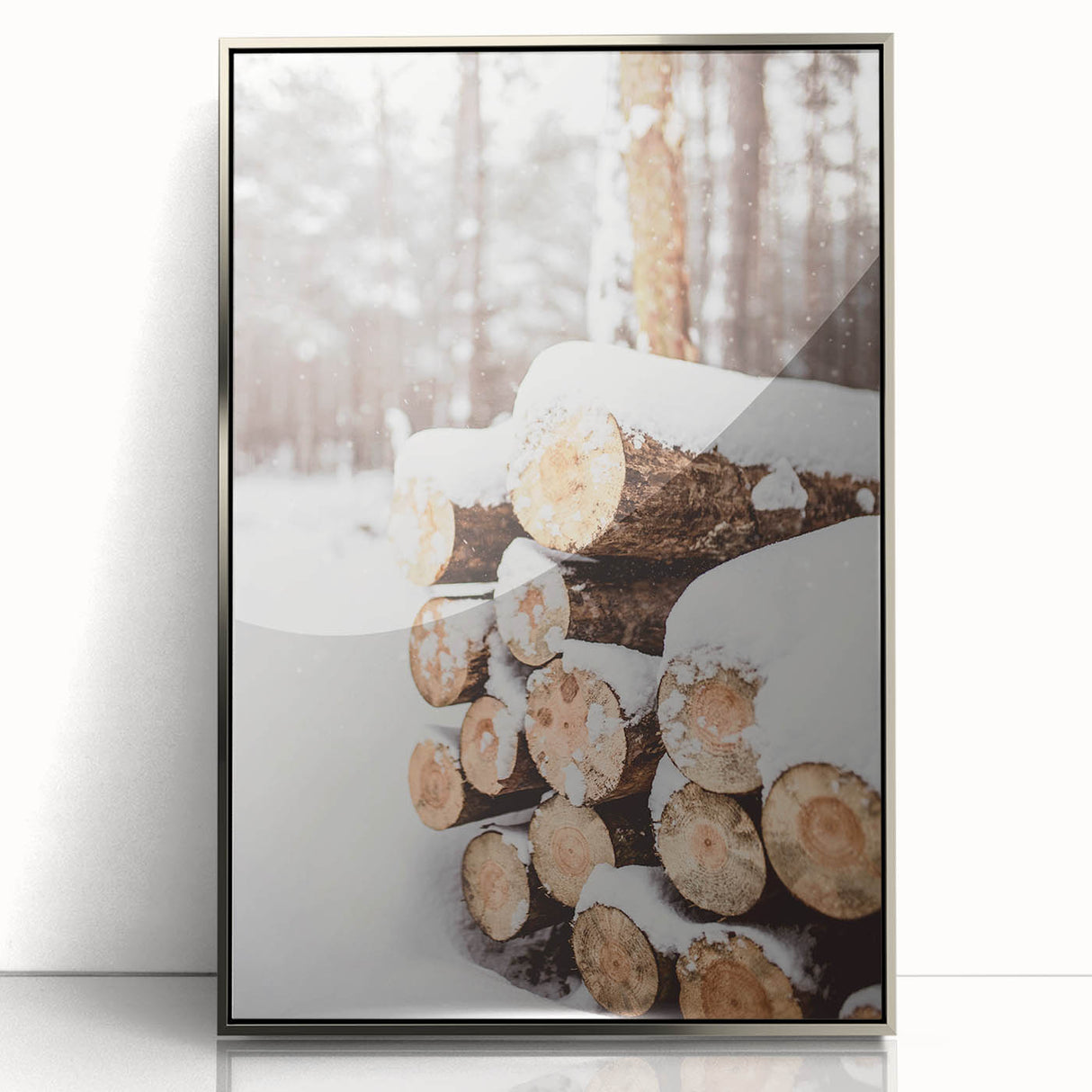 Mid-century modernist art depicting a winter scene in muted blue and white tones, acrylic print framed in silver.