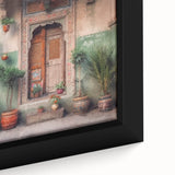Close-up of a black framed canvas featuring a textured depiction of an ornate Indian door in vibrant colors.