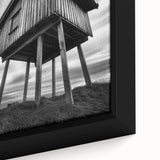Framed canvas featuring a close-up of black textured architecture with colorful accents, ideal for large living room walls.