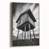 Framed canvas featuring a vintage landscape painting with black and gold tones, suitable for bedroom wall art.