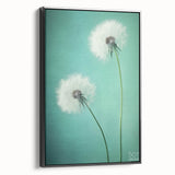 Framed canvas wall art showcasing a vibrant floral and botanical design with a sleek black frame, ideal for enhancing modern home decor aesthetics.