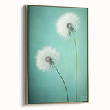 Framed botanical canvas art showcasing intricate floral designs in vibrant colors, accented with a gold frame, ideal for enhancing home decor elegance.