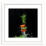 Abstract art print of assorted fruits in vibrant colors on a white framed mat, ideal for dining room decor.