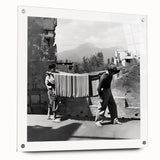 Large abstract wall art on acrylic glass depicting colorful figures and food, suitable for dining room decor.