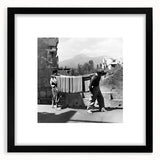 Extra large abstract art print featuring vibrant, colorful textures on a black framed canvas, ideal for living room decor.