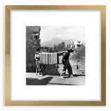 Extra large abstract art print featuring textured patterns in gold and cream, framed in gold, ideal for living room decor.