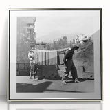 Mid-century modernist art depicting people dining, in silver framed acrylic, suitable for modern art wall decor.