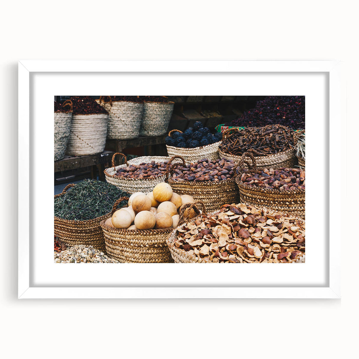 Extra large abstract art print depicting an African scenery in earth tones on a white framed canvas.