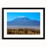 Extra large abstract art print depicting a colorful, textured African scenery on a framed canvas.