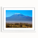 Extra large abstract art print of a Kenyan landscape in muted earth tones on a textured canvas, ideal for living room decor.