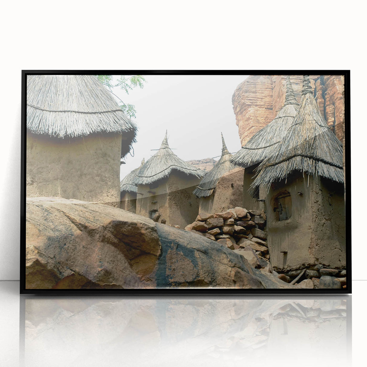 Large abstract wall art of a Mali scenery in mid-century modernist style, framed in black acrylic.