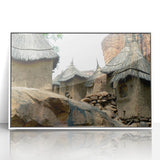 Acrylic print of an African Mali scenery in muted earth tones, framed in white, suitable for nursery wall decor.