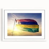 Extra large abstract art print of a textured African scenery in vibrant earth tones, framed with a white mat.