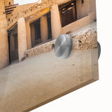 Large abstract acrylic print of a Moroccan landscape in earth tones.