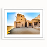 Extra large abstract art print depicting a Moroccan landscape in textured earth tones on a framed white mat.