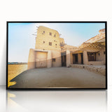 Large abstract wall art featuring a Moroccan landscape in muted earth tones on a framed acrylic.