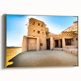 Framed canvas landscape art painting of a Moroccan scenery in vibrant colors on a black background.