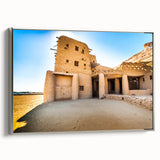 Vintage poster art of a Moroccan landscape on framed canvas, featuring vibrant colors, ideal for living room decor.