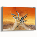 Vintage poster art of a Namibian landscape on a framed canvas, featuring a black, silver, and colorful palette.