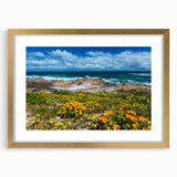 Extra large abstract art print of an African landscape in muted earth tones on a textured canvas, framed in gold.