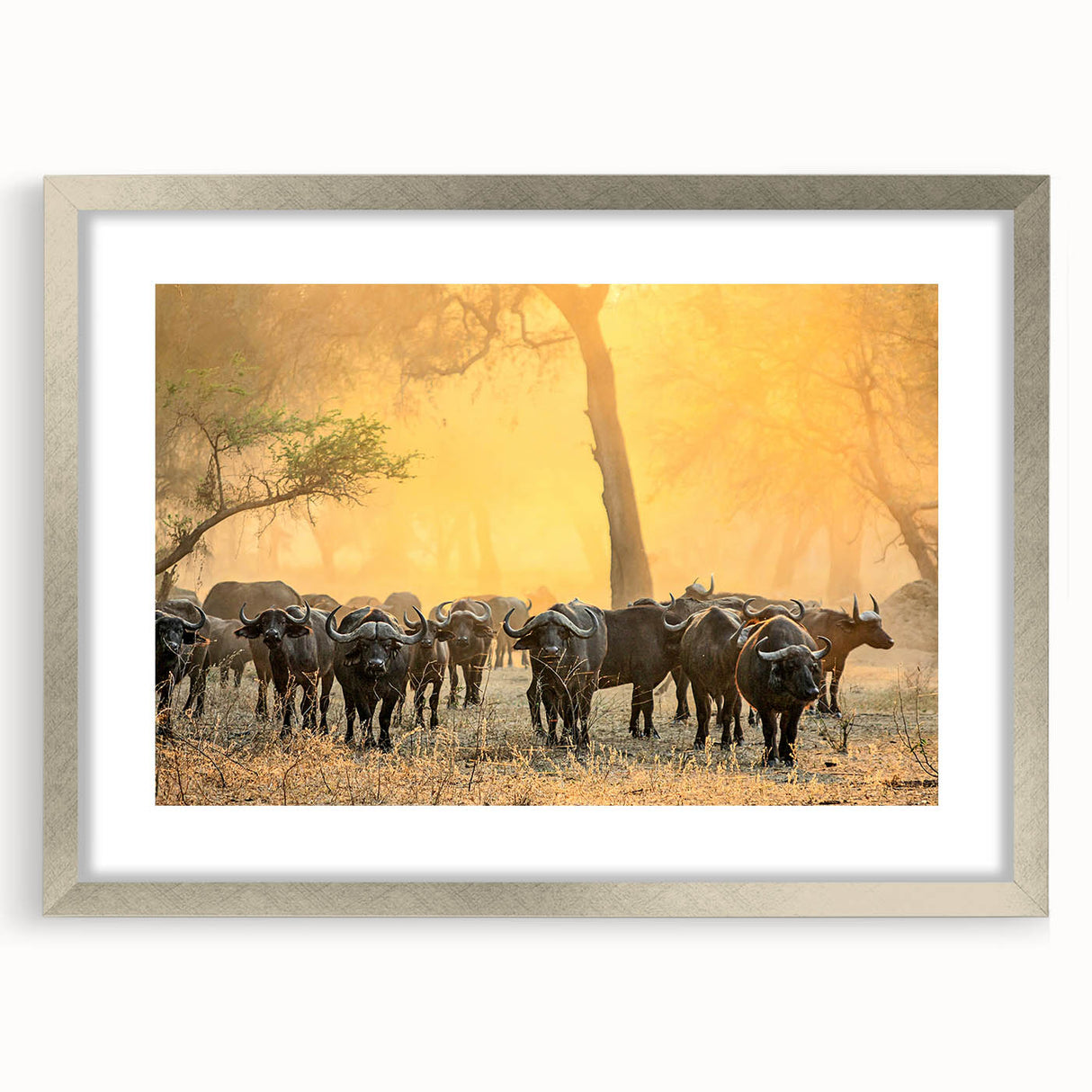 Textured abstract art print depicting African savannah in earth tones, framed in silver, ideal for bedroom art.