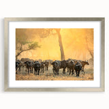 Textured abstract art print depicting African savannah in earth tones, framed in silver, ideal for bedroom art.
