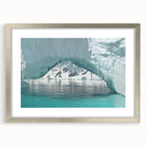 Textured abstract art print of an Antarctic landscape in muted blue and white tones, framed in silver.