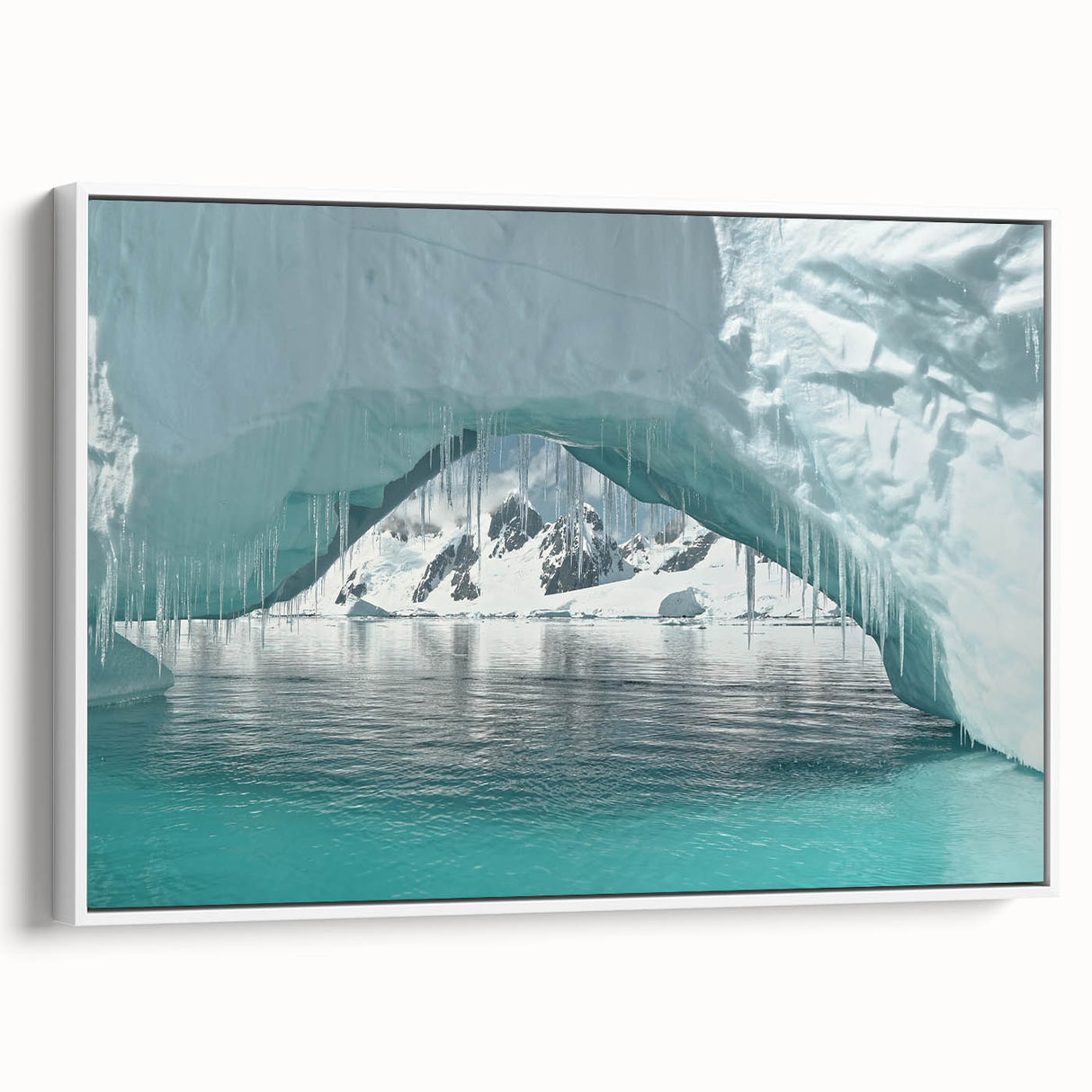 Vintage poster art of an Antarctic landscape on framed canvas, featuring colorful art with black accents.