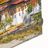 Large abstract wall art depicting serene Bhutanese scenery in muted earth tones on acrylic glass.